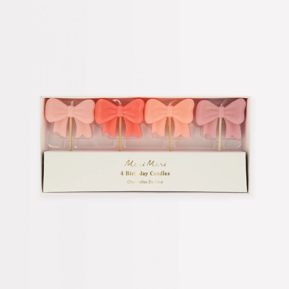 4 PINK BOW CANDLES