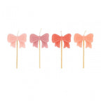 4 PINK BOW CANDLES