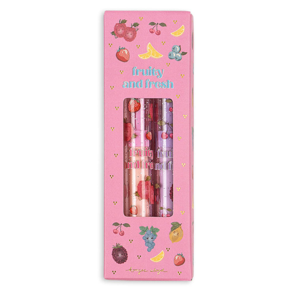 Pink packaging with two lip balms and fruit illustrations on a white background