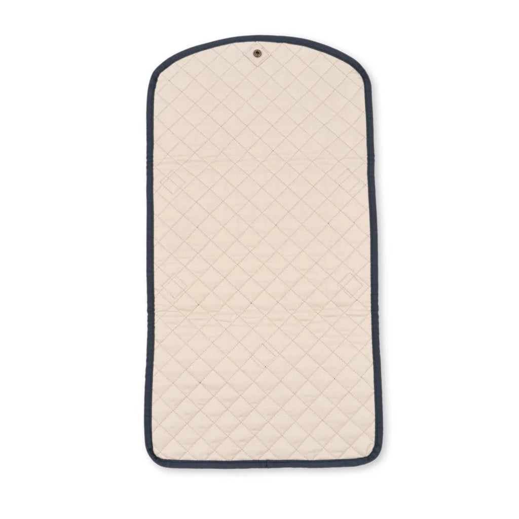 A quilted cream-colored garment bag with a dark navy blue border, shown flat against a solid white background.