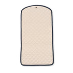 A quilted cream-colored garment bag with a dark navy blue border, shown flat against a solid white background.