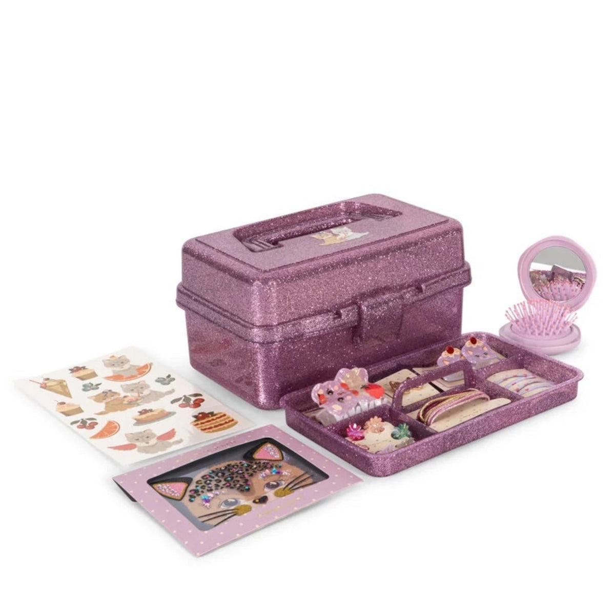 Purple toy makeup set with various items on a white background