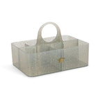 A translucent speckled gray plastic organizer caddy with a single integrated handle and a small gold star accent on the front, shown on a plain white background.