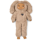 A plush doll dressed in a shaggy beige bunny costume with long floppy ears, a brown face, and a small dark heart patch on the chest, photographed against a plain white background.