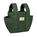 A dark green quilted canvas tote bag with vertical stitched pinstripes, dual top handles, side pockets, and a small tan leather brand patch on the front, shown against a plain white background.
