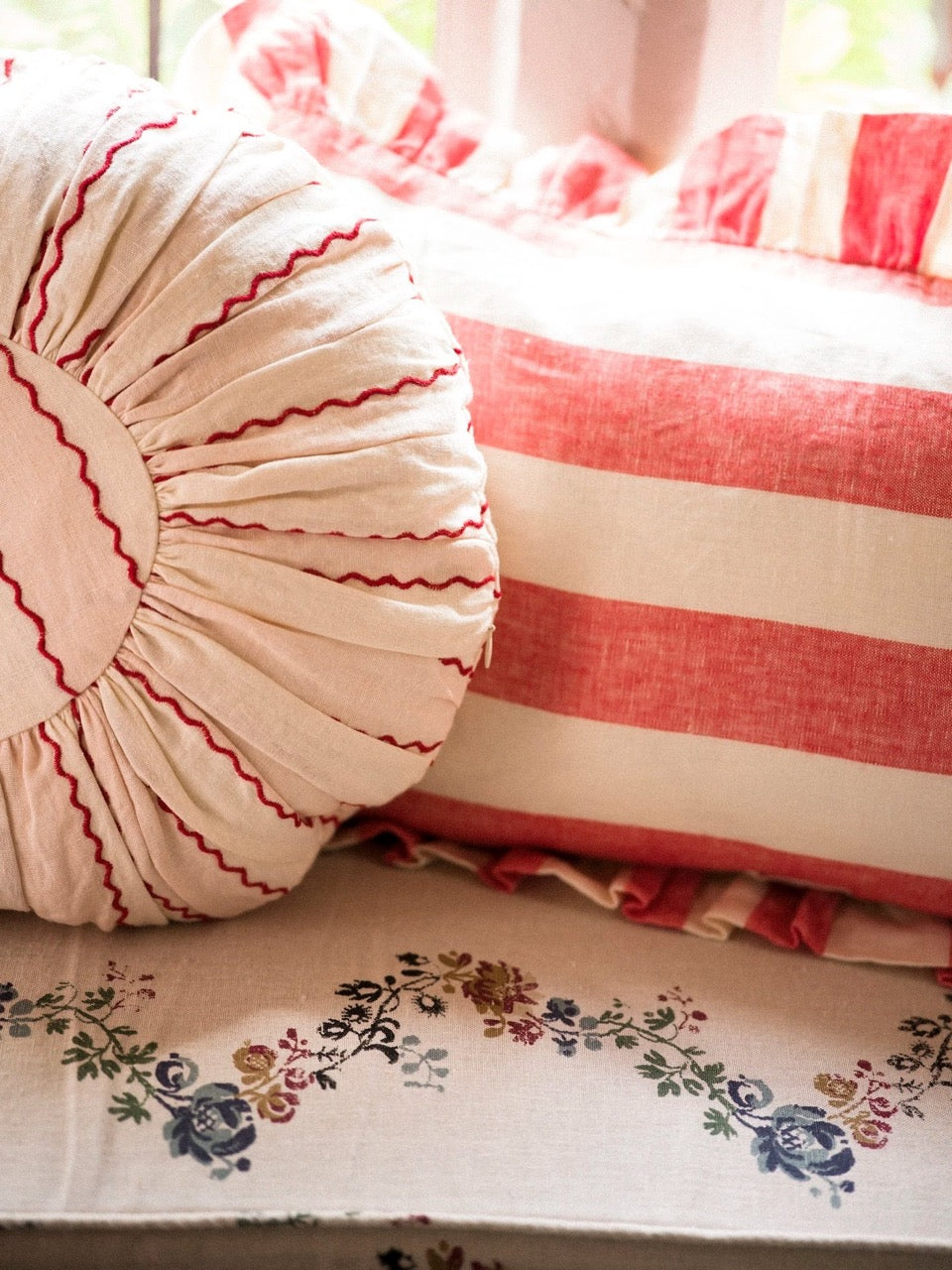 MARIONETTE EMBROIDERED STRIPE ROUND CUSHION - PINK/CREAM (WITH PAD)