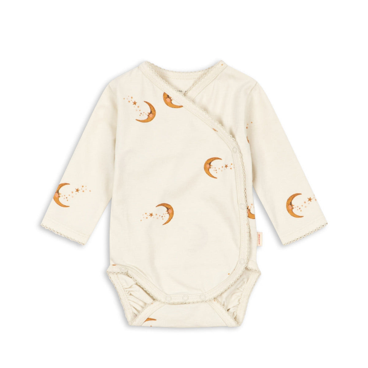 An off-white long-sleeve baby wrap bodysuit with an all-over print of orange crescent moons and tiny stars, displayed flat against a white background.